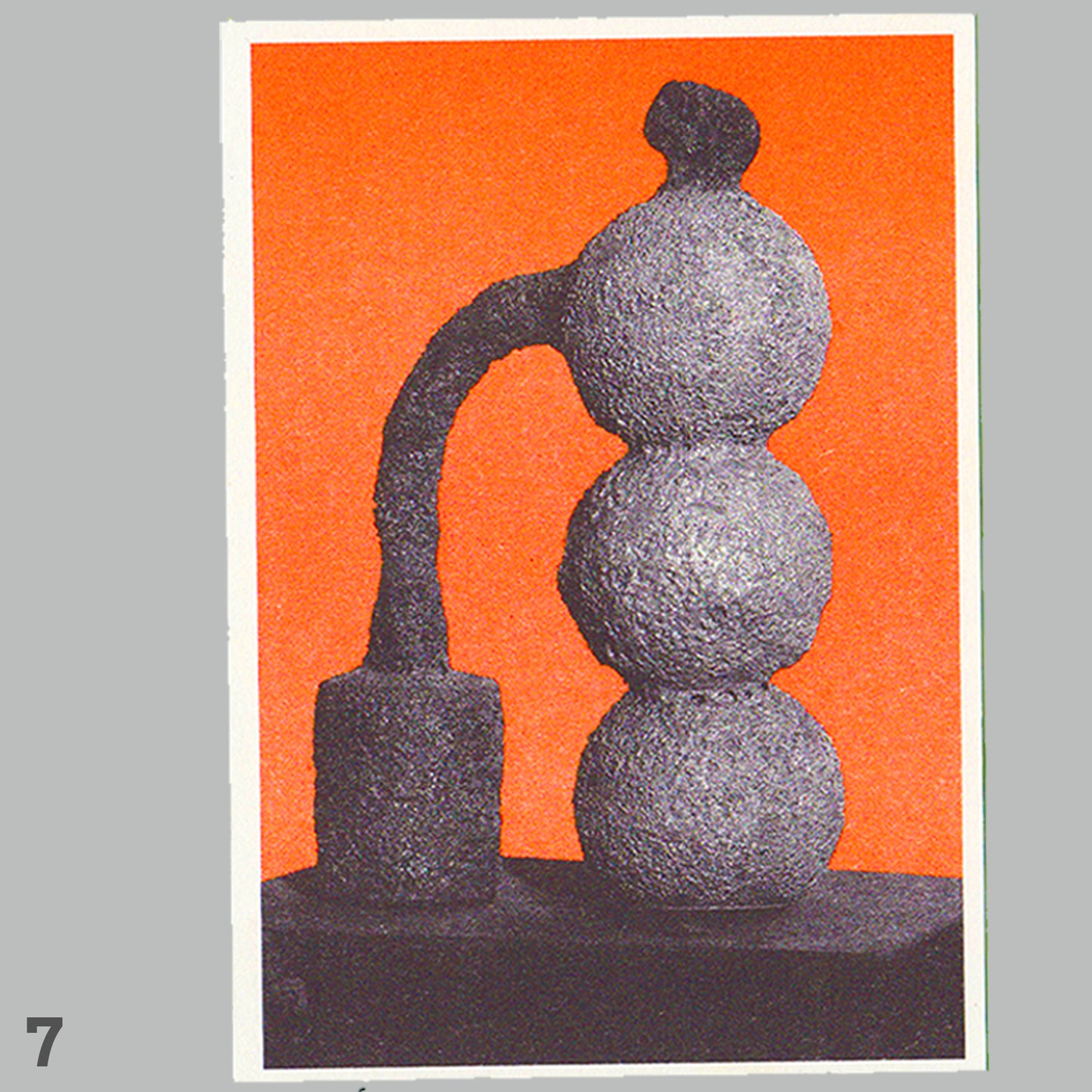 Abstract sculpture with three spherical shapes on an orange background